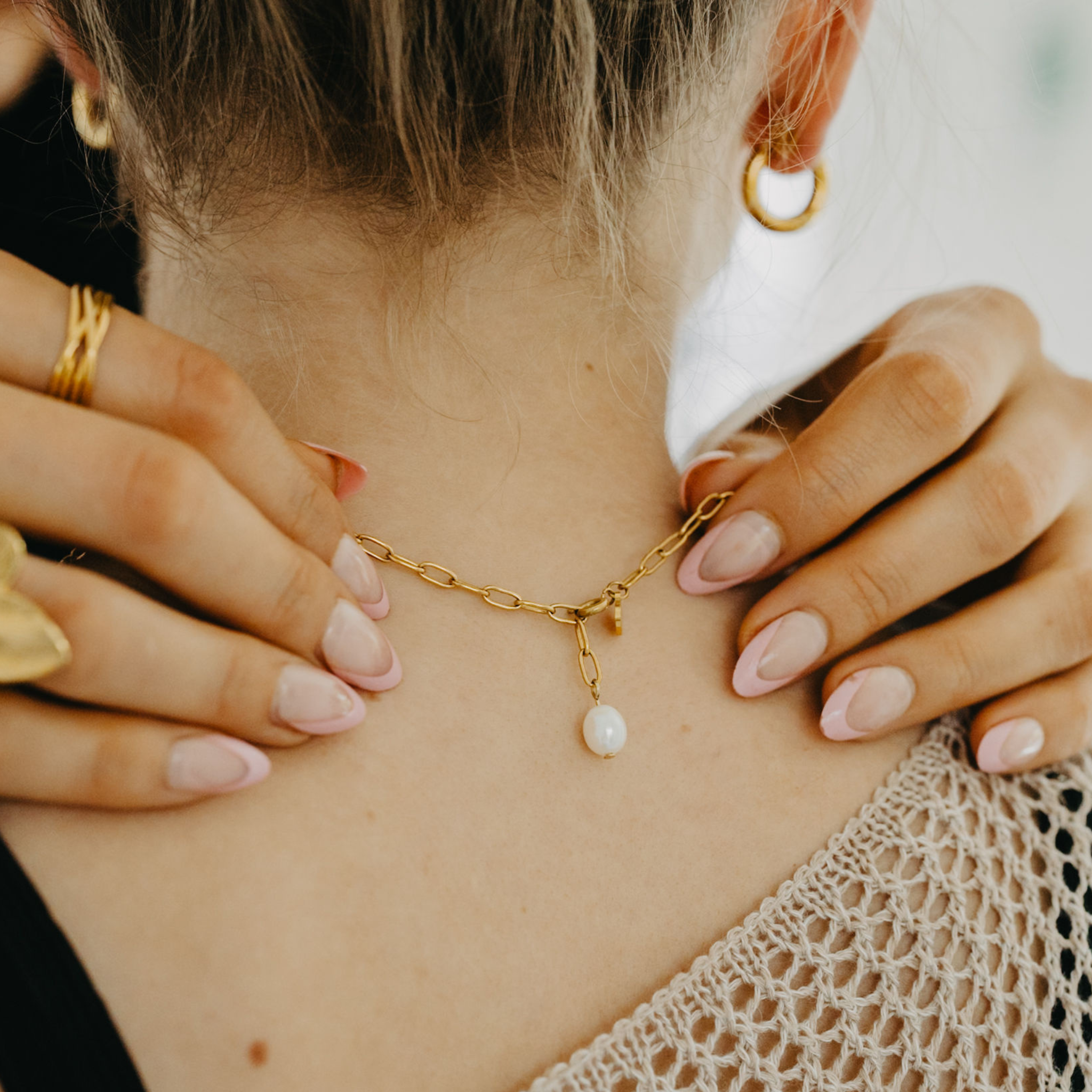 Back details of the pearl on the 18K pvd paperclip chain necklace