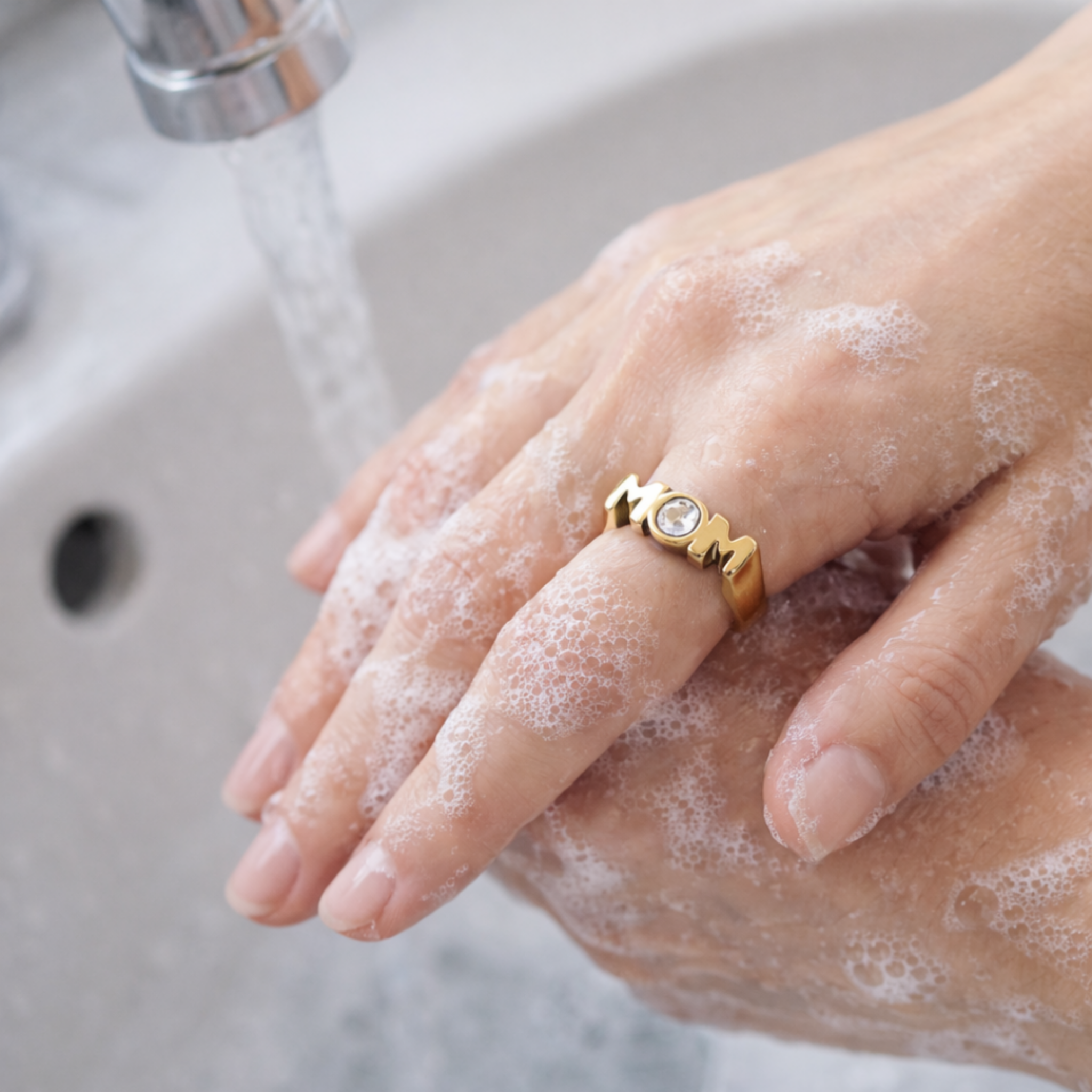 Mom Keepsake ring with cubic zirconia accent worn while washing hands, waterproof 18K gold PVD ring available in sizes 6 7 and 8 designed for real life