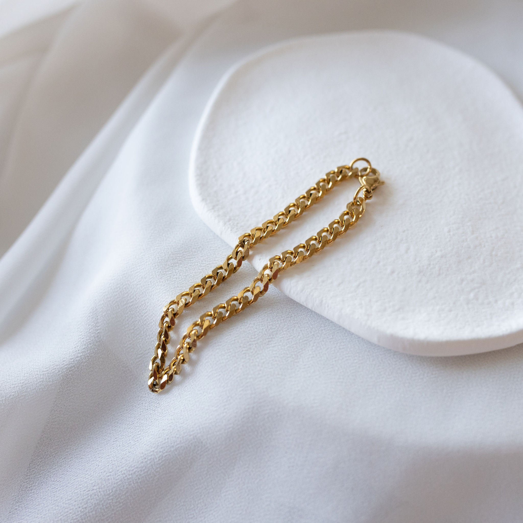 Sunseeker Cuban link bracelet in 18K gold PVD with polished finish waterproof jewelry