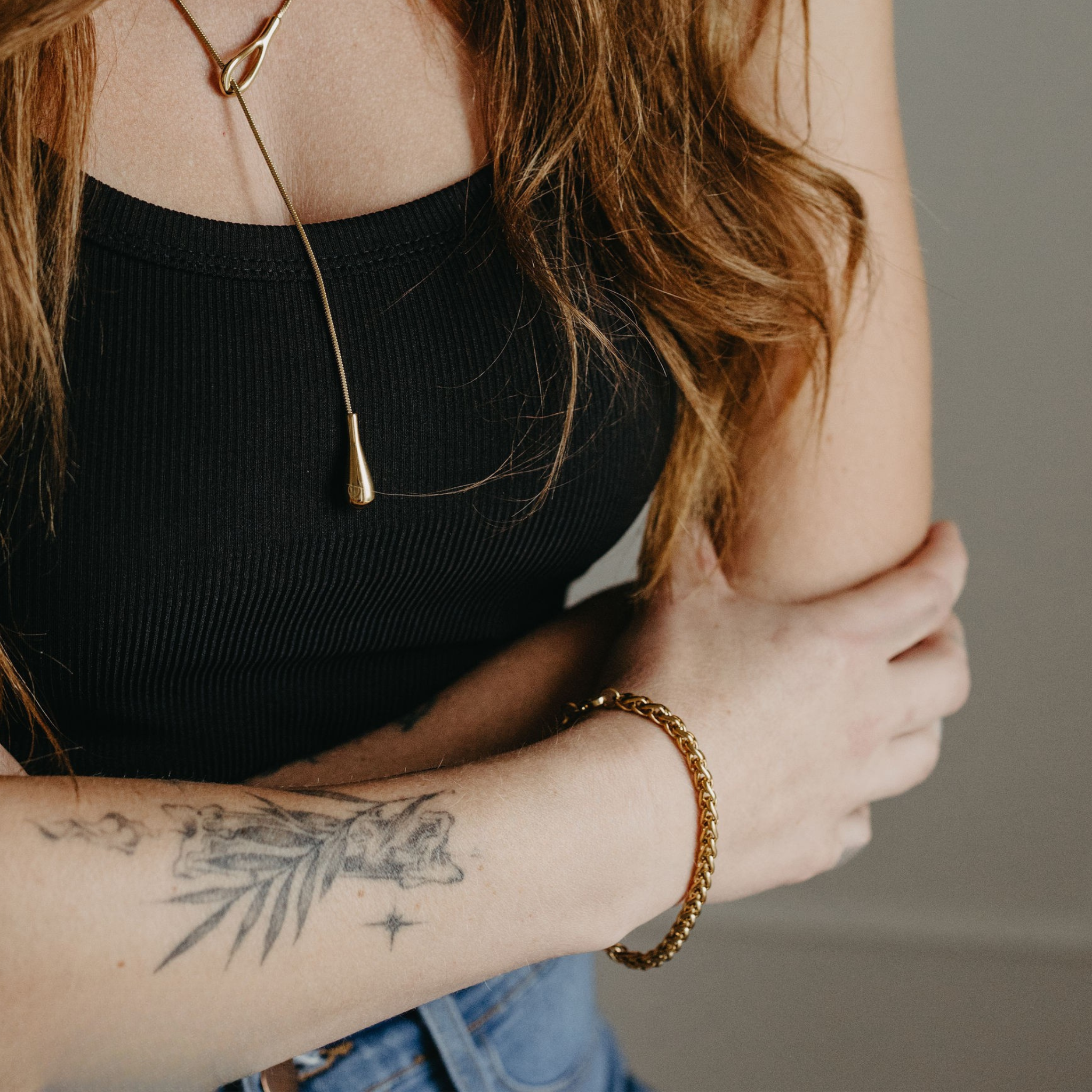 model wearing Surfside 5mm wheat chain bracelet in 18K gold PVD