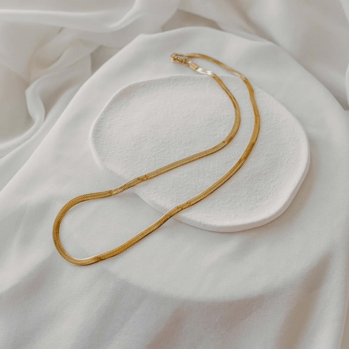 Eclipse herringbone necklace in 18K gold PVD with smooth flat chain design waterproof jewelry
