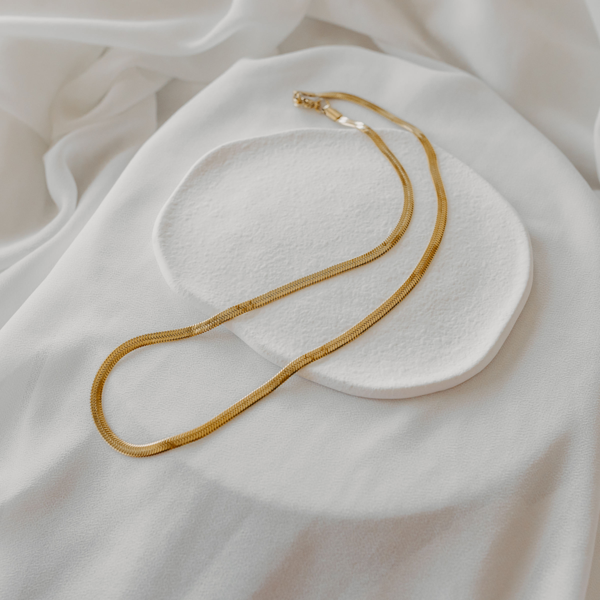 Eclipse herringbone necklace in 18K gold PVD with smooth flat chain design waterproof jewelry