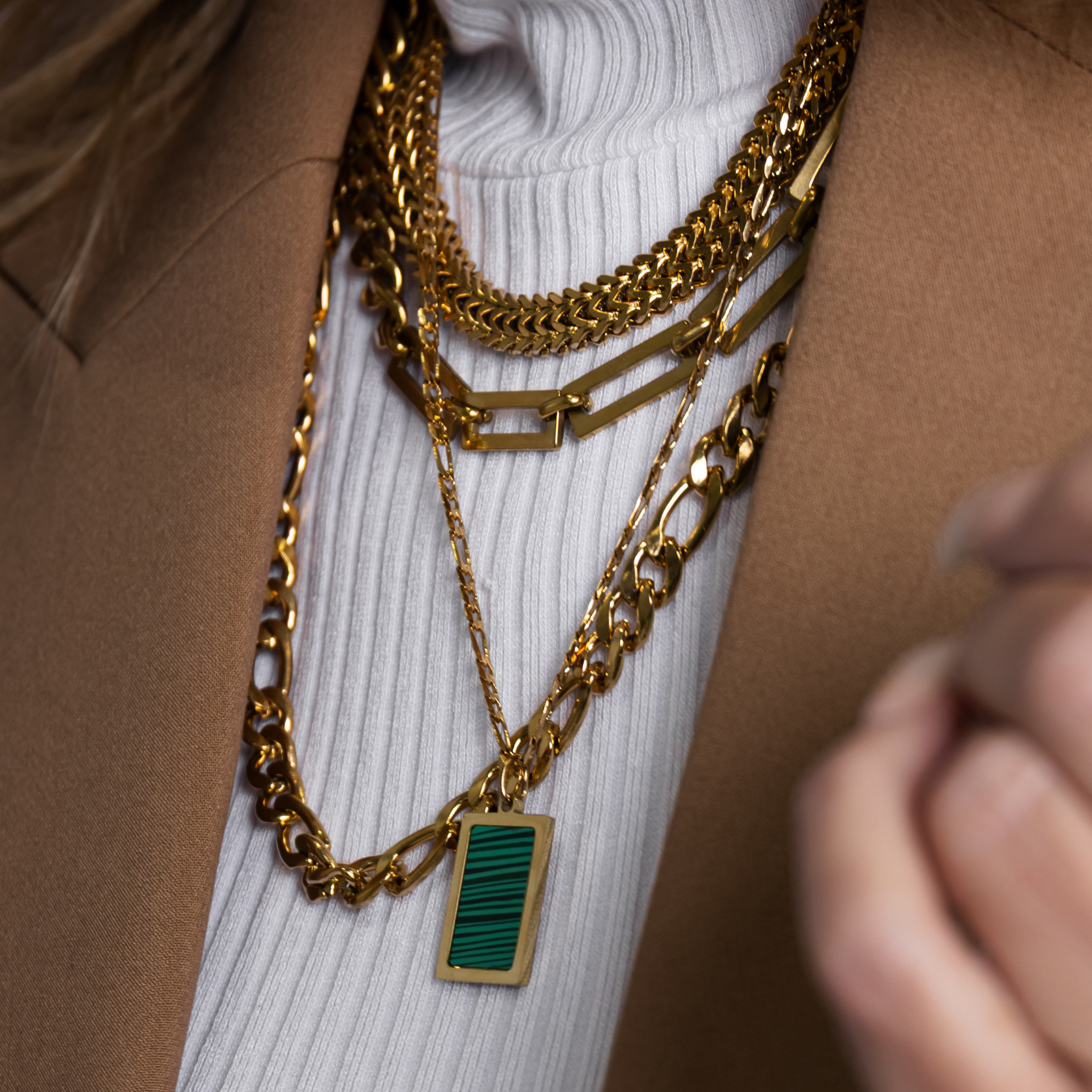 Forge figaro chain necklace styled with layered gold chains in 18K gold PVD waterproof jewelry