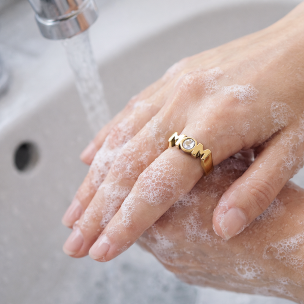 Mom Keepsake ring with cubic zirconia accent worn while washing hands, waterproof 18K gold PVD ring available in sizes 6 7 and 8 designed for real life