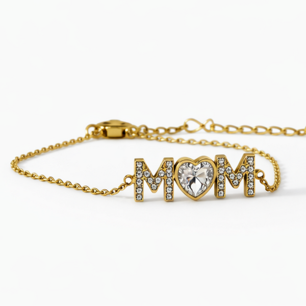 Mom Radiance bracelet in 18K gold PVD featuring MOM lettering with heart shaped cubic zirconia center stone, waterproof tarnish resistant adjustable bracelet