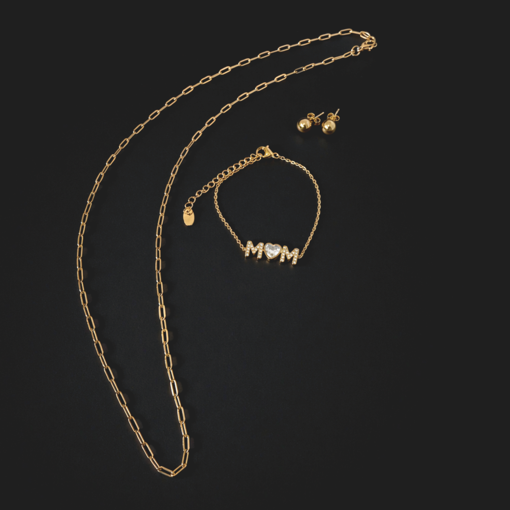 Mom Radiant Set in 18K gold PVD featuring Mom Radiance bracelet, Sandswept paperclip chain necklace, and Morning Dew stud earrings, waterproof jewelry gift set for Mother’s Day
