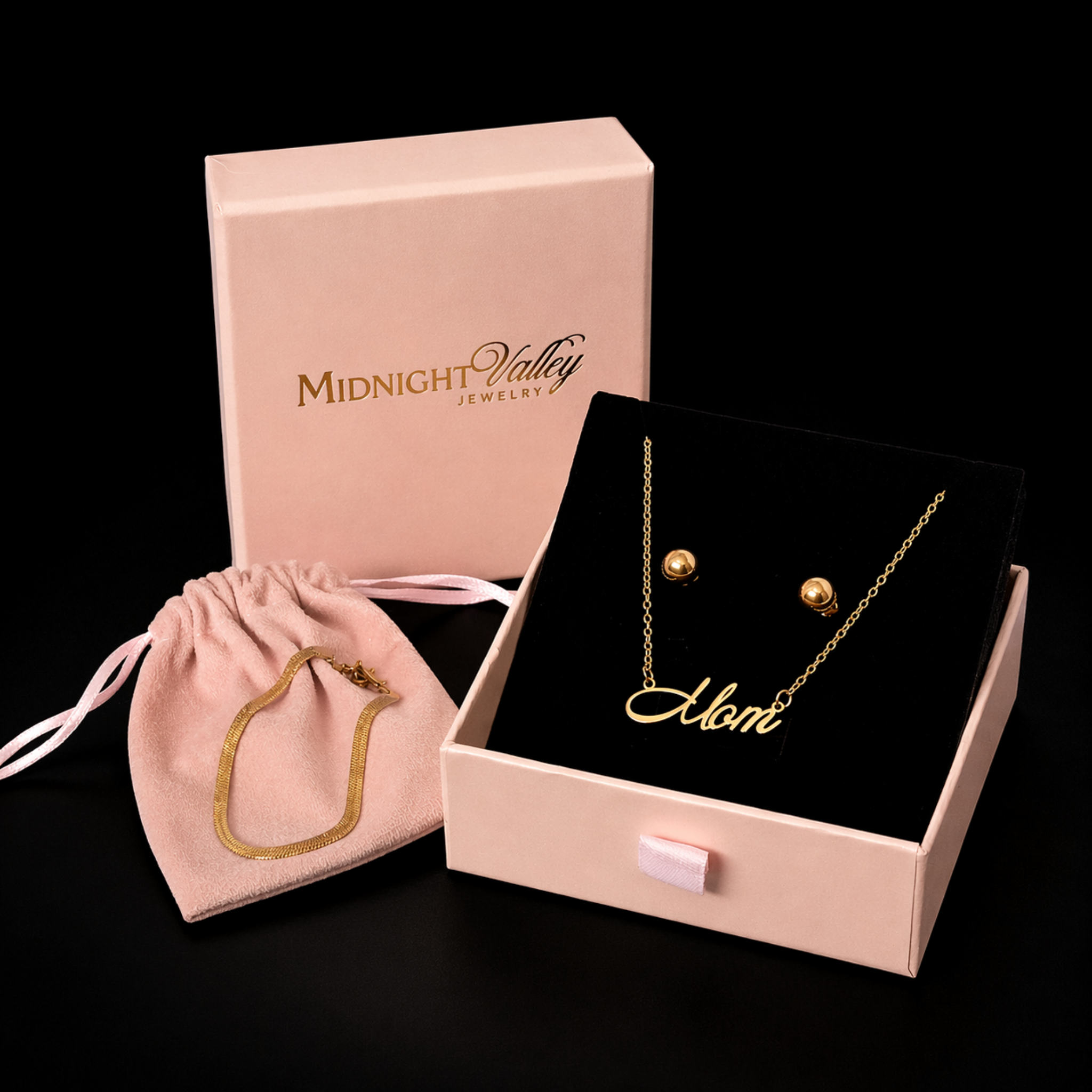 Mom’s Timeless Set in luxury packaging featuring script style Forever Mom necklace, herringbone bracelet, and gold stud earrings, waterproof jewelry gift for mom