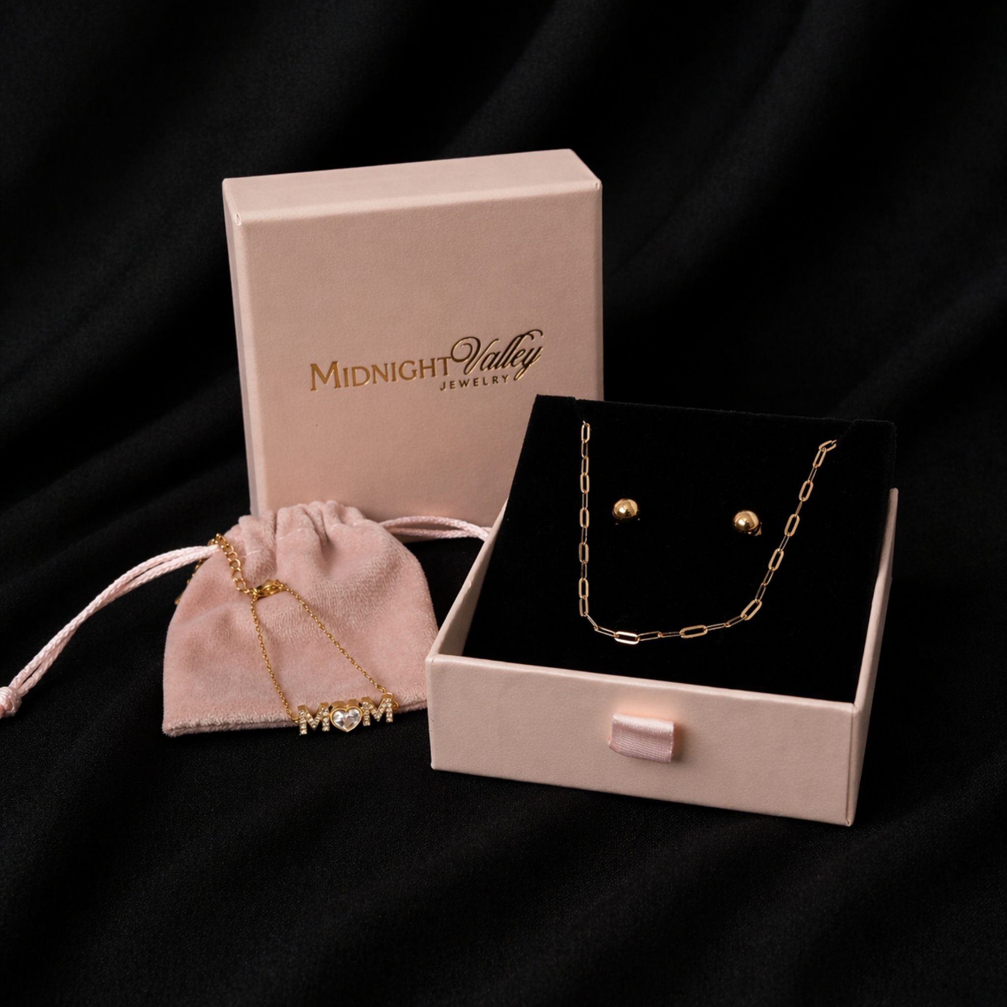 Mom Radiant Set in luxury gift packaging with paperclip chain necklace, Mom Radiance bracelet, and gold stud earrings, waterproof 18K gold PVD jewelry gift for mom